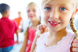 Photo: Closeup of cute girl with blue eyes smiling Closeup of cute girl with blue eyes smiling