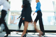Blurred motion of business people walking