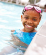 Girl smiling in the swimming pool