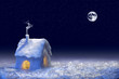 snow covered house at christmas eve
