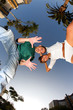Young couple over blue sky