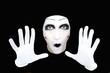 Portrait of the mime in white gloves