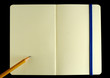 Classic opened moleskine note book with penci Classic opened moleskine note book with penci