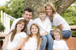 Portrait of family, mom and dad with their four children