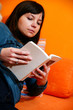 Photo: Cute girl reading a book Cute girl reading a book