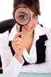 front view of smiling young woman holding magnifier front view of smiling young woman holding magnifier