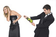 man opening a champagne bottle at a party with her girlfriend