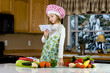young chef reading recipe