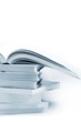 Stack of brochures in blue toned