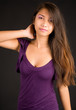Beautiful Brunette Lady Posing in a Purple Dress