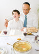 father and sun celebrating passover