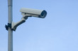 Surveillance Camera mounted on a post looking down Surveillance Camera mounted on a post looking down