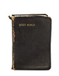 Photo: Old torn bible isolated on white Old torn bible isolated on white