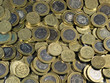 Mass of UK sterling coins.  One and two pound denominations.