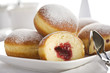 bismarck doughnuts on a plate bismarck doughnuts on a plate