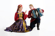 Man and woman in Russian folk suits Man and woman in Russian folk suits