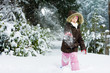 kid throwing snowball