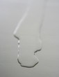 Liquid, oil shape on a metal surface