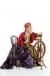 Woman And Spinning Wheel