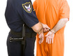 Police Transfers Prisoner in Handcuffs
