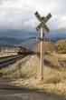 train approaching a rural crossing