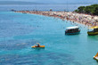 people relaxing on beach