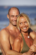 happy couple at the ocean