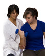 physical therapist helps a patient