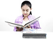 asian girl of indian origin reading a book