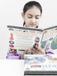 asian girl of indian origin reading a book