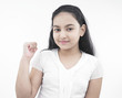 portrait of an asian teenage girl showing thumbs up