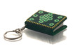 small green key-ring book