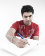 Photo: a smart asian man of indian origin with a blank placard a smart asian man of indian origin with a blank placard