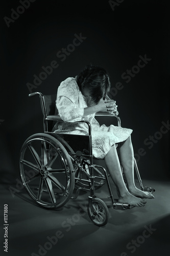 Photo: Woman in a wheelchair Woman in a wheelchair
