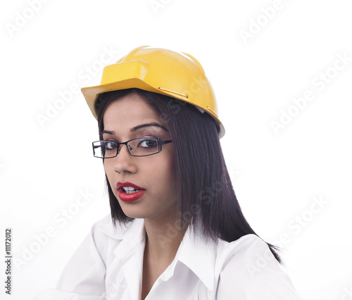 Photo: asian girl with a factory helmet asian girl with a factory helmet