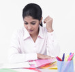 woman working at her office desk