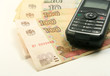 Russian cell phone and money Russian cell phone and money