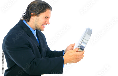 Photo: Angry Young Caucasian Male Toward Clock Angry Young Caucasian Male Toward Clock