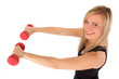 smiling blonde holding two barbells