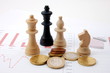 chess man over business chart