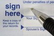 Income tax form signature.