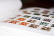 Dutch postage stamps in an album.