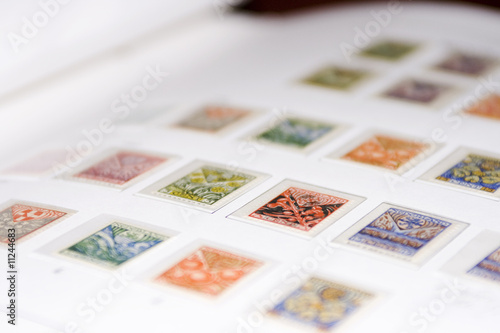 Photo: Dutch postage stamps in album Dutch postage stamps in album
