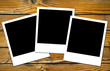 polaroids frames over old wooden boards brown color