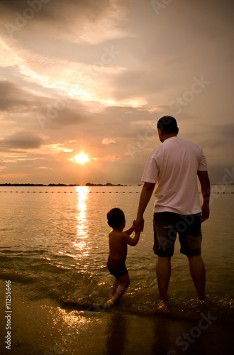 Father+and+son+holding+hands