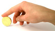 Hand with a golden coin