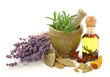 Mortar with fresh rosemary, oil and dried spices