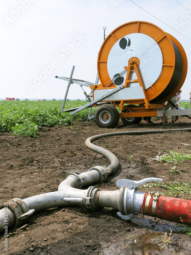 Irrigation installation (watering machine) in the field