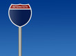 Interstate sign against blue sky
