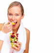 Healthy Life - Health conscious blond eating fruit